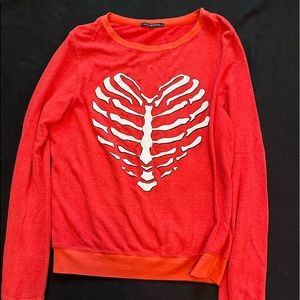 Wild fox Size M. Red sweater with heart rib cage. Brand new.